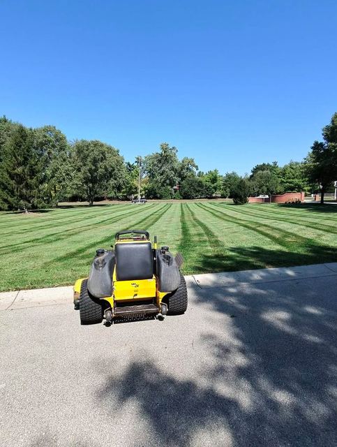 Checkerboard pattern lawn mowing on a commercial property in Minnesota